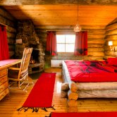 Kakslauttanen East Village small cabin bedroom.